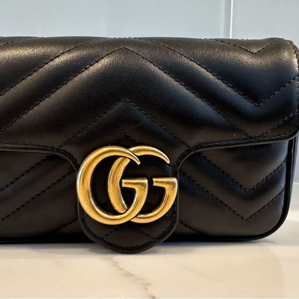 Gucci Black Leather Bag with Gold Accent
